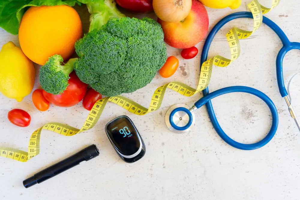 Fresh apples, berries, papaya, and guava arranged for diabetes control diet.